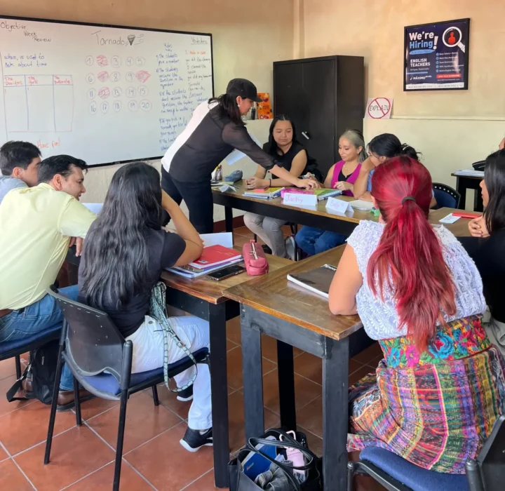 School of TEFL trainee in the classroom with students in Antigua, Guatemala
