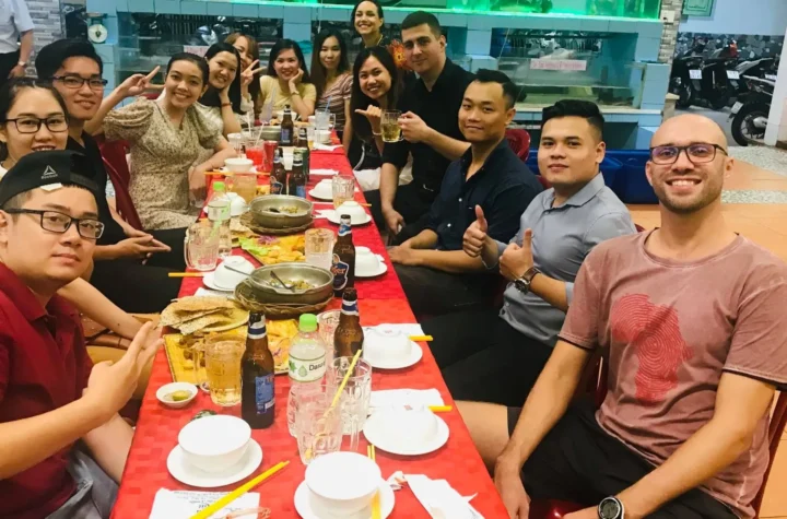 School of TEFL Ho Chi Minh City trainees and students enjoying a meal