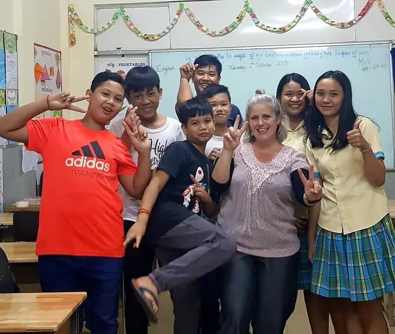 School of TEFL Ho Chi Minh City trainee and students in the classroom